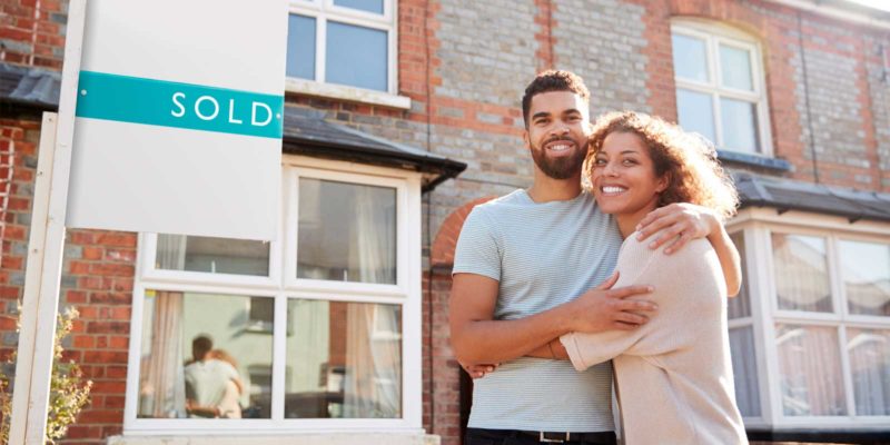 A couple buying a home after reading the real estate market trends of 2019