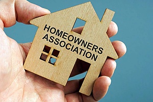 a wooden house representing a homeowners association