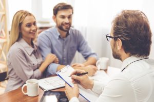 couple considering buying a second home together